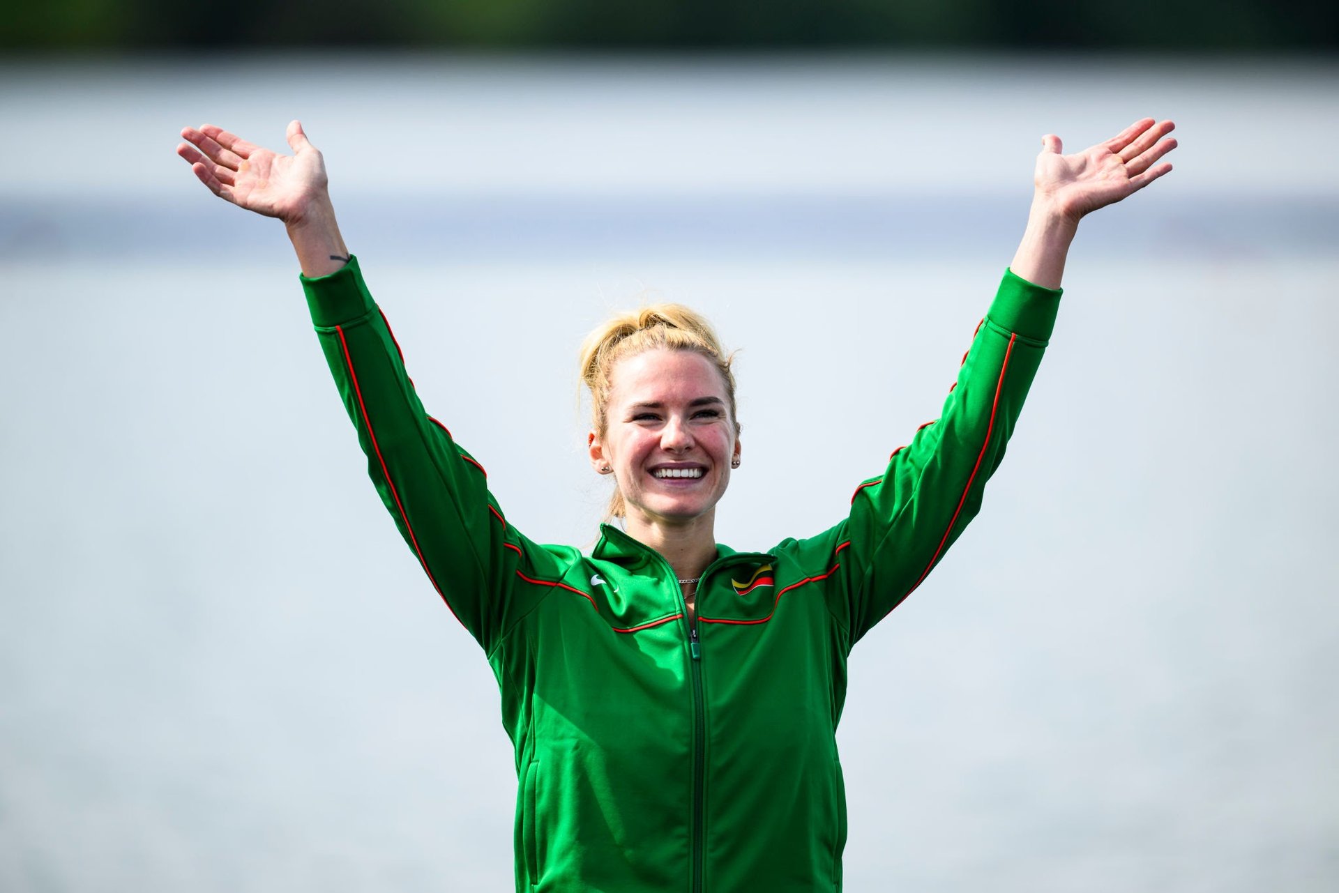 Viktorija Senkutė celebrating her Olympic rowing bronze medal